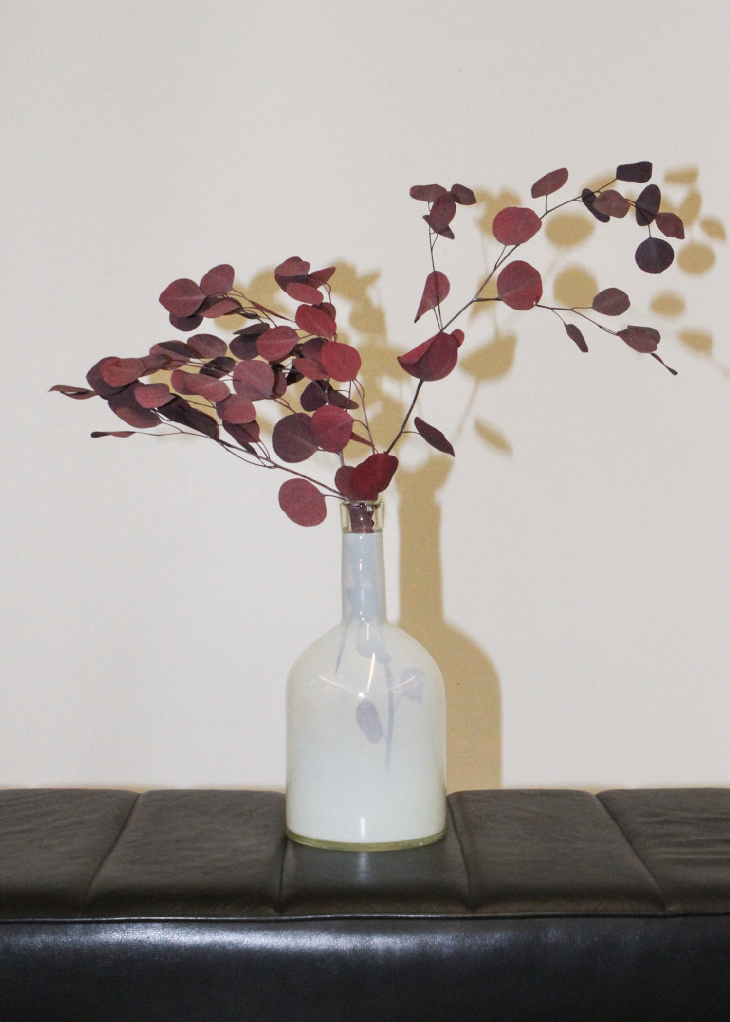 Milked glass vase in frosted white and semi‑opaque finish, sculptural mid century form with organic curves. Collectible decorative object ideal for modern interiors and minimalist styling