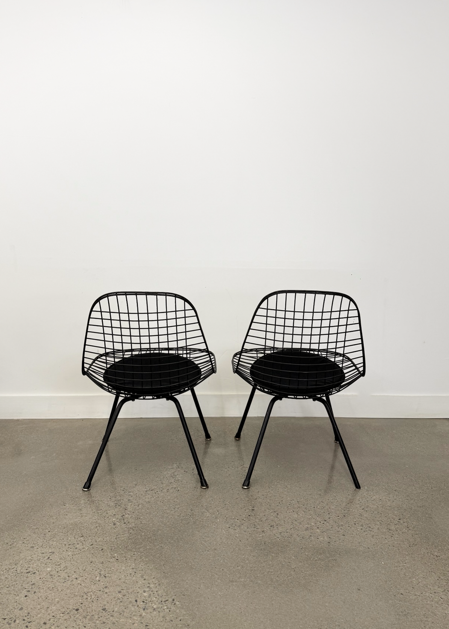 (2) LKX Wire Lounge Chairs
