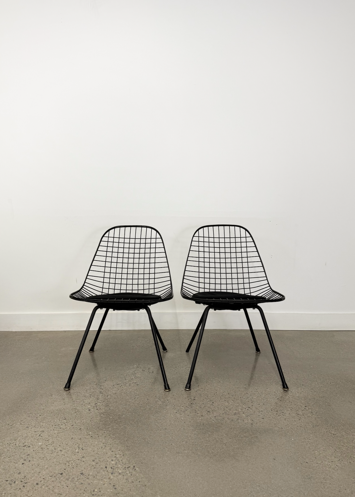 (2) LKX Wire Lounge Chairs