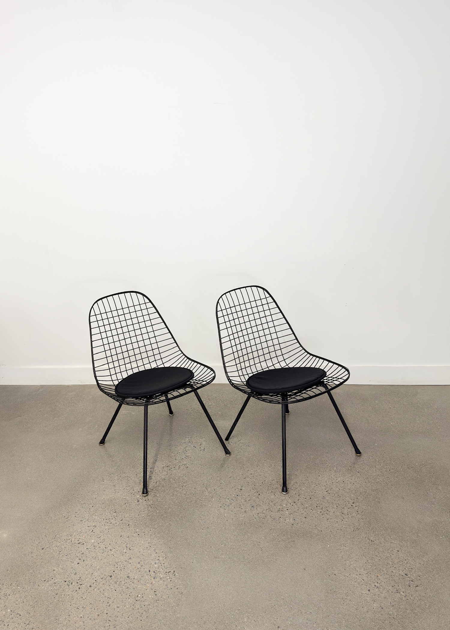 (2) LKX Wire Lounge Chairs