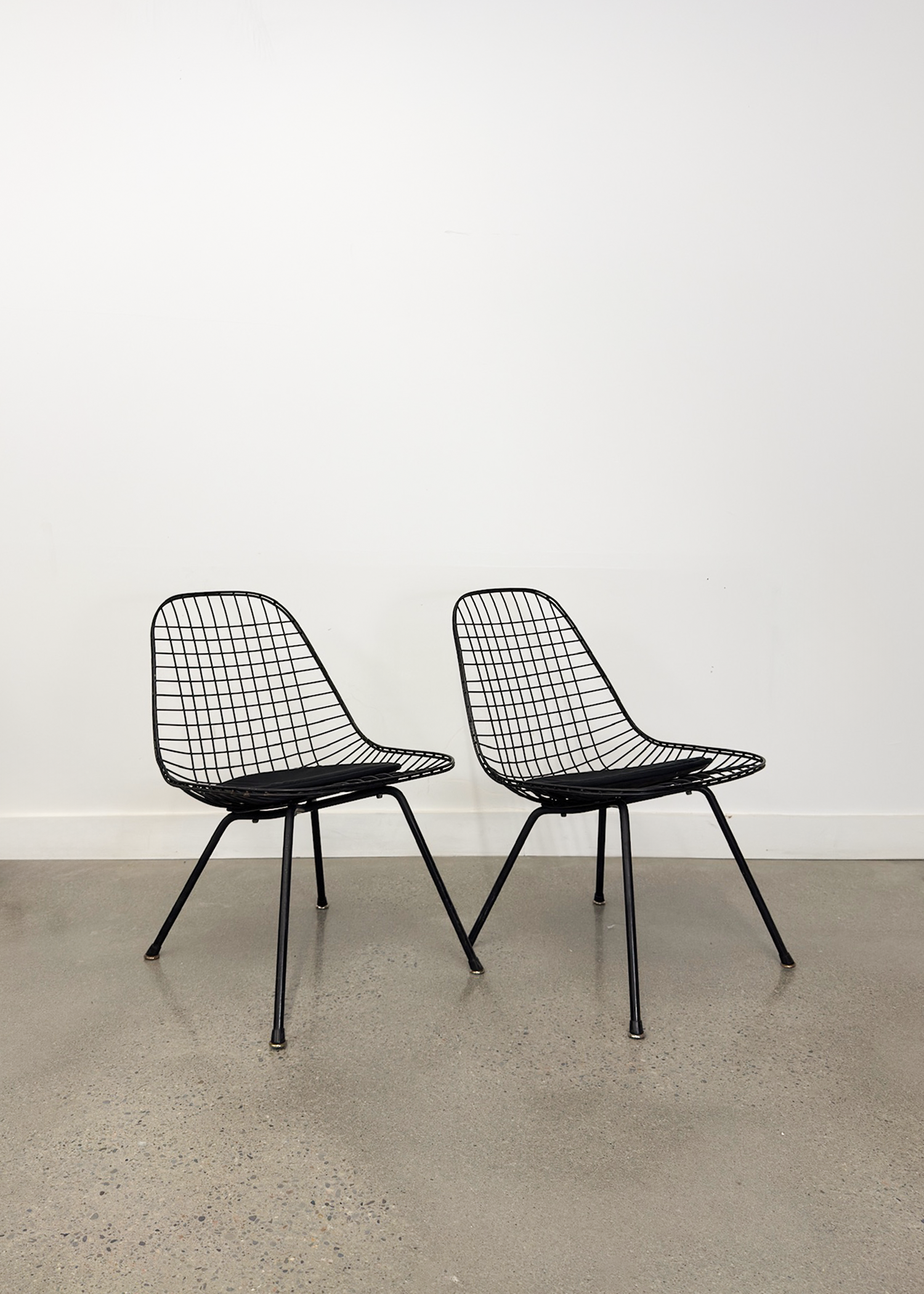 (2) LKX Wire Lounge Chairs