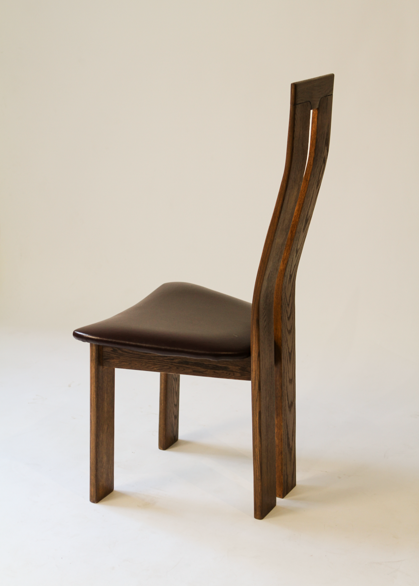 (6) Stained oak dining chairs