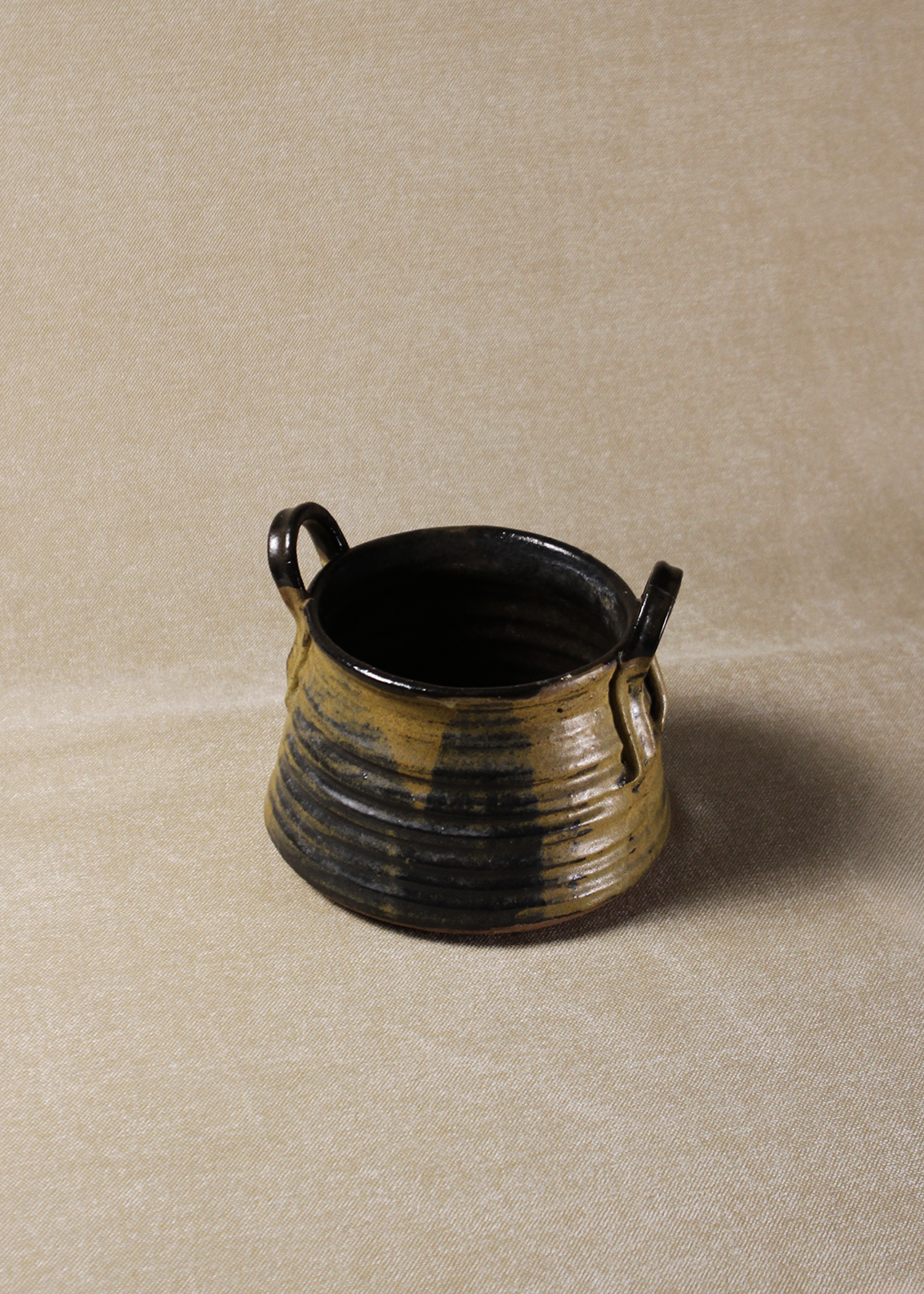 Vintage glazed ceramic bowl with handles