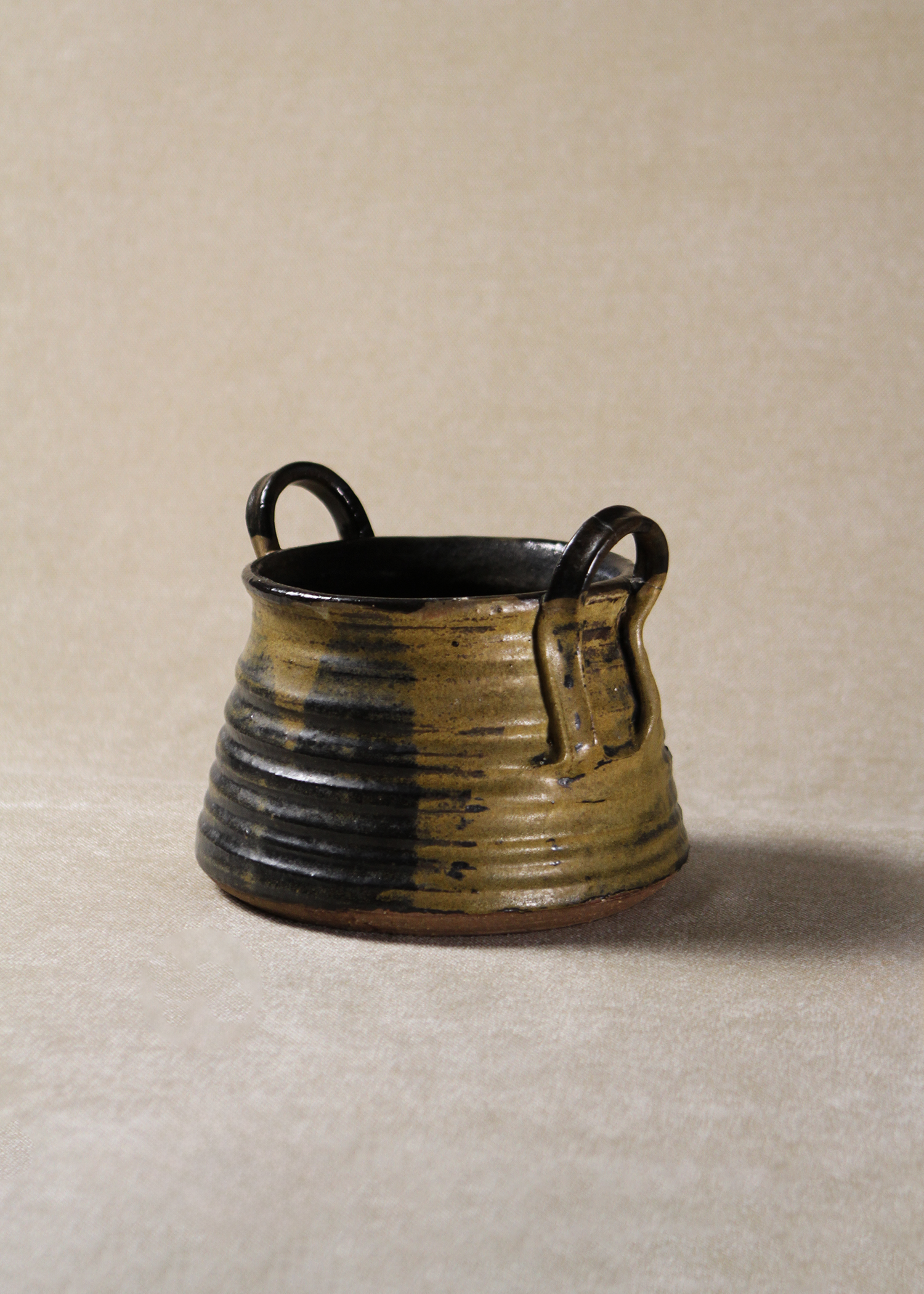 Vintage glazed ceramic bowl with handles