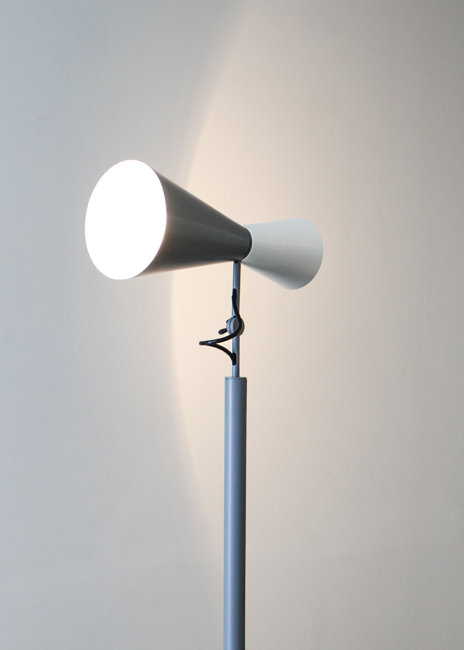 Parliament floor lamp by Le Corbusier for Nemo Lighting, adjustable dual‑cone aluminum diffusers in painted finish casting both direct and indirect light. Sold by In Corso Studio a vintage furniture company specializing in rare mid century furniture in Toronto Canada.