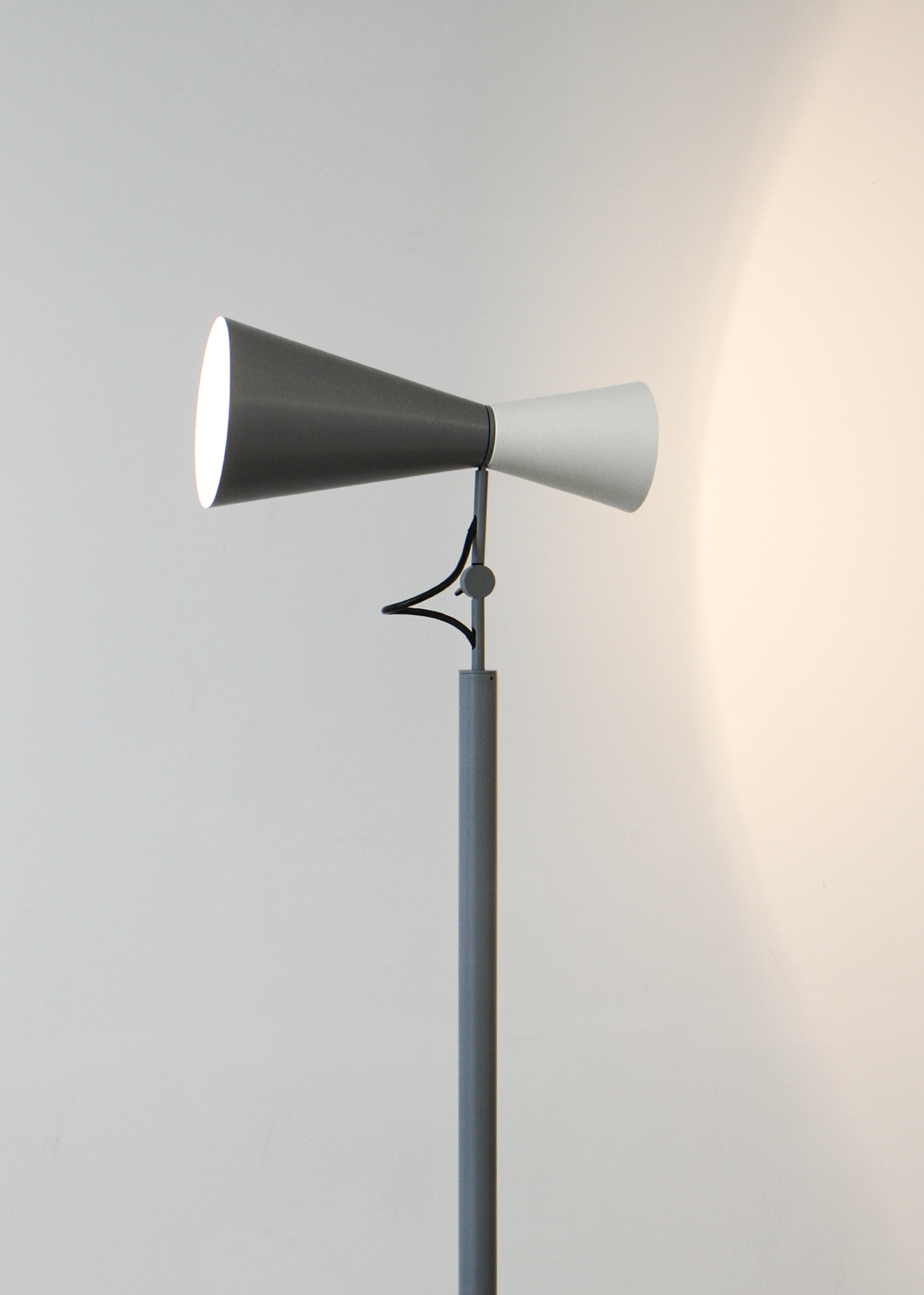 Parliament floor lamp by Le Corbusier for Nemo Lighting, adjustable dual‑cone aluminum diffusers in painted finish casting both direct and indirect light. Sold by In Corso Studio a vintage furniture company specializing in rare mid century furniture in Toronto Canada.
