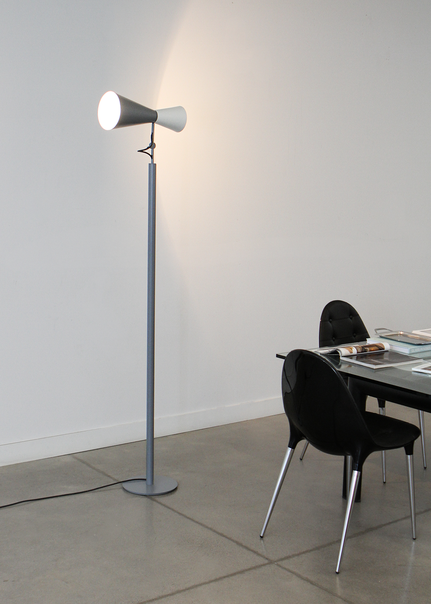 Parliament floor lamp by Le Corbusier for Nemo Lighting, adjustable dual‑cone aluminum diffusers in painted finish casting both direct and indirect light. Sold by In Corso Studio a vintage furniture company specializing in rare mid century furniture in Toronto Canada.