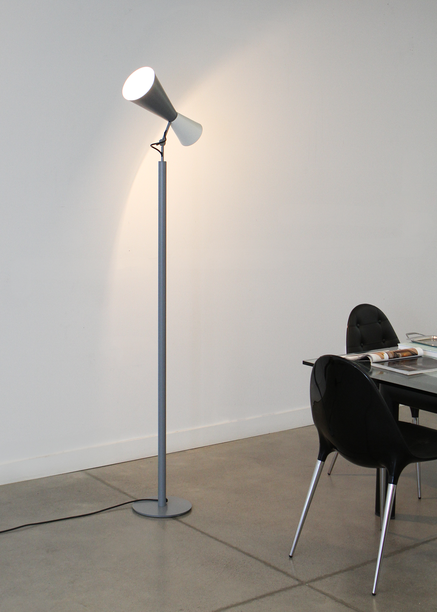 Parliament floor lamp by Le Corbusier for Nemo Lighting, adjustable dual‑cone aluminum diffusers in painted finish casting both direct and indirect light. Sold by In Corso Studio a vintage furniture company specializing in rare mid century furniture in Toronto Canada.