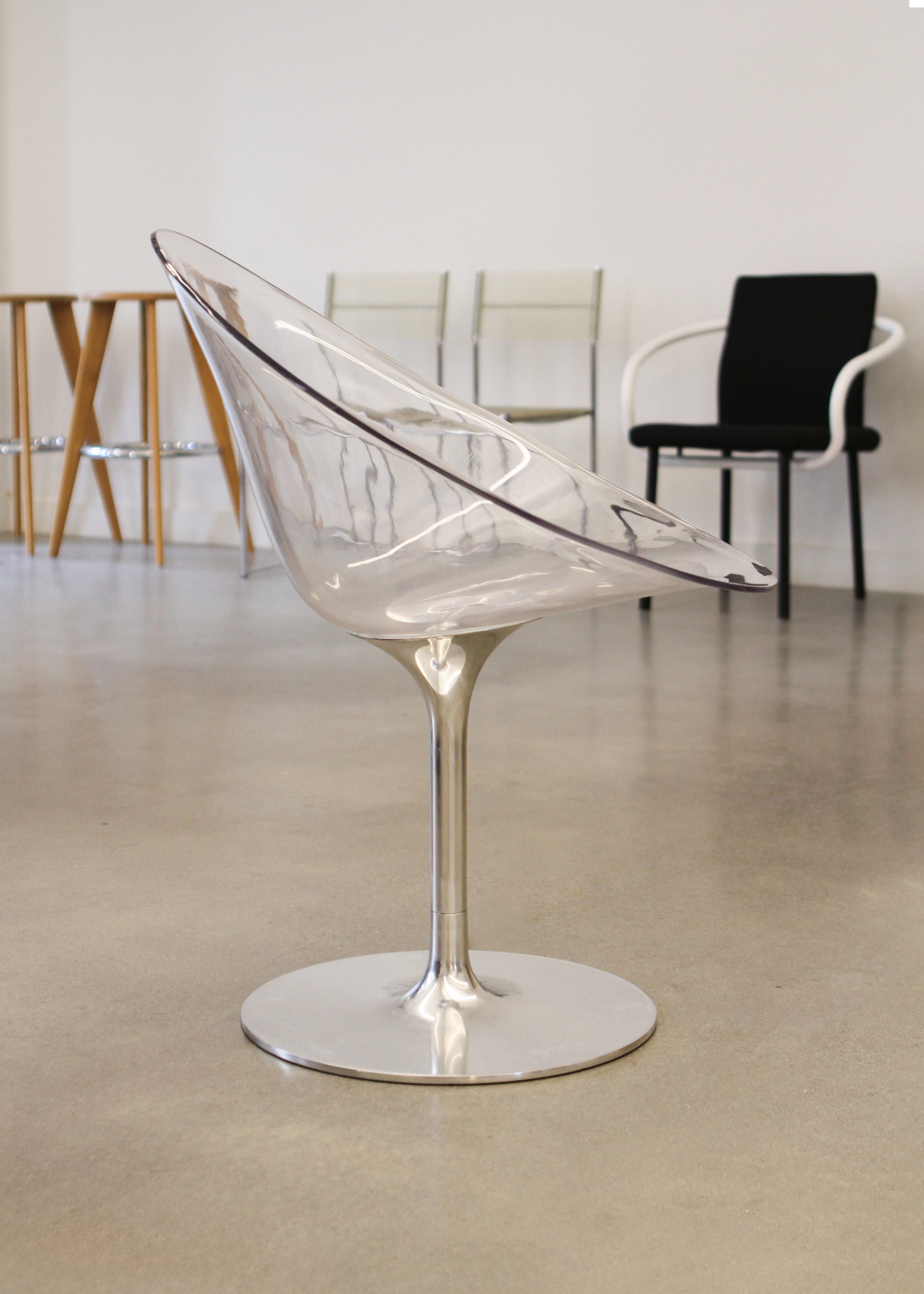Ero|S| swivel armchair by Philippe Starck for Kartell: clear polycarbonate shell and cast-aluminium tulip base, egg-shaped seating form. Available at vintage furniture platform In Corso – incorsostudio.com. in toronto canada 