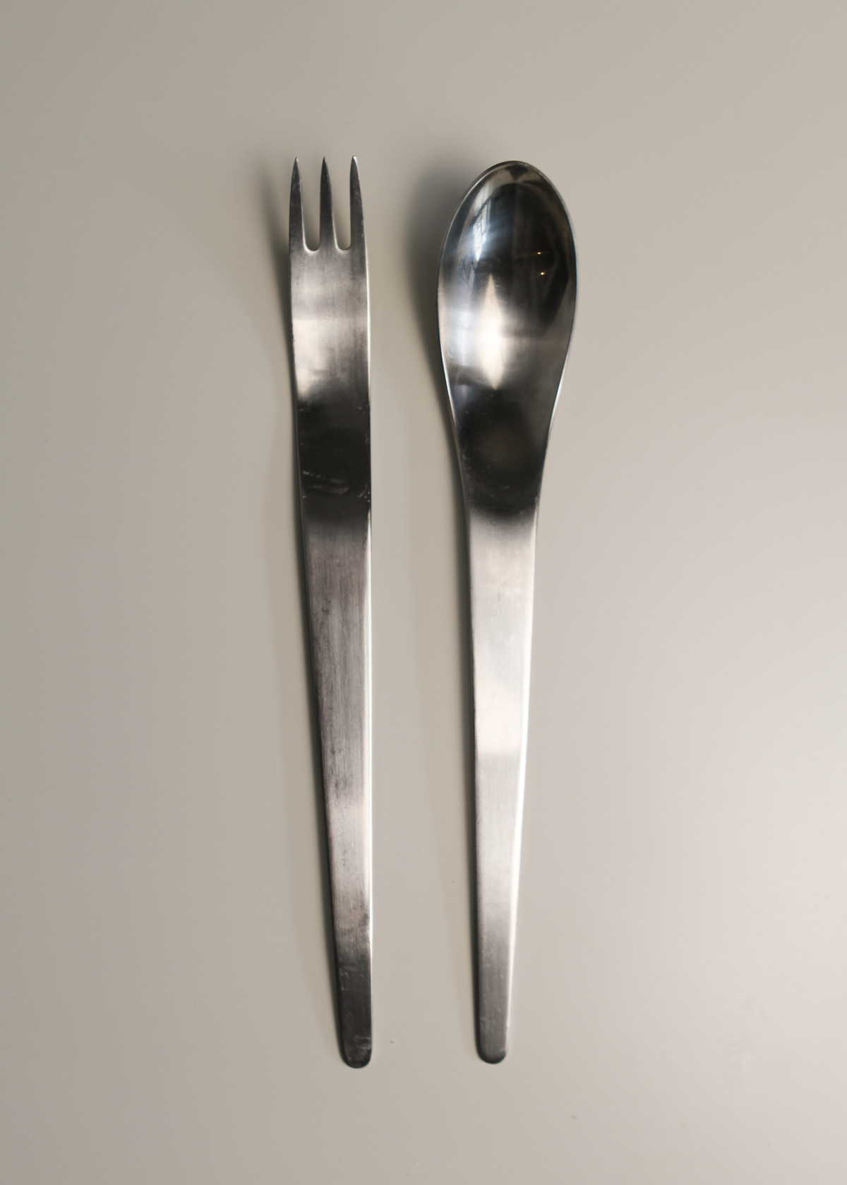 Salad Servers by Arne Jacobsen for Georg Jensen. Shown on In Corso Studio, a vintage furniture platform in Toronto.