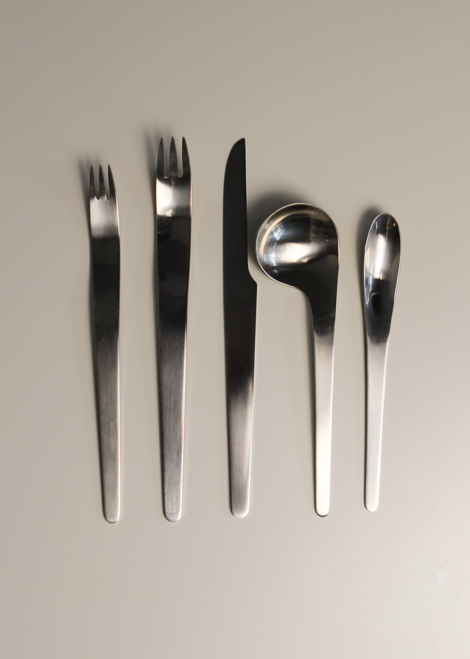 Arne Jacobsen for Georg Jensen flatware set. Shown on In Corso Studio, a vintage furniture platform in Toronto.