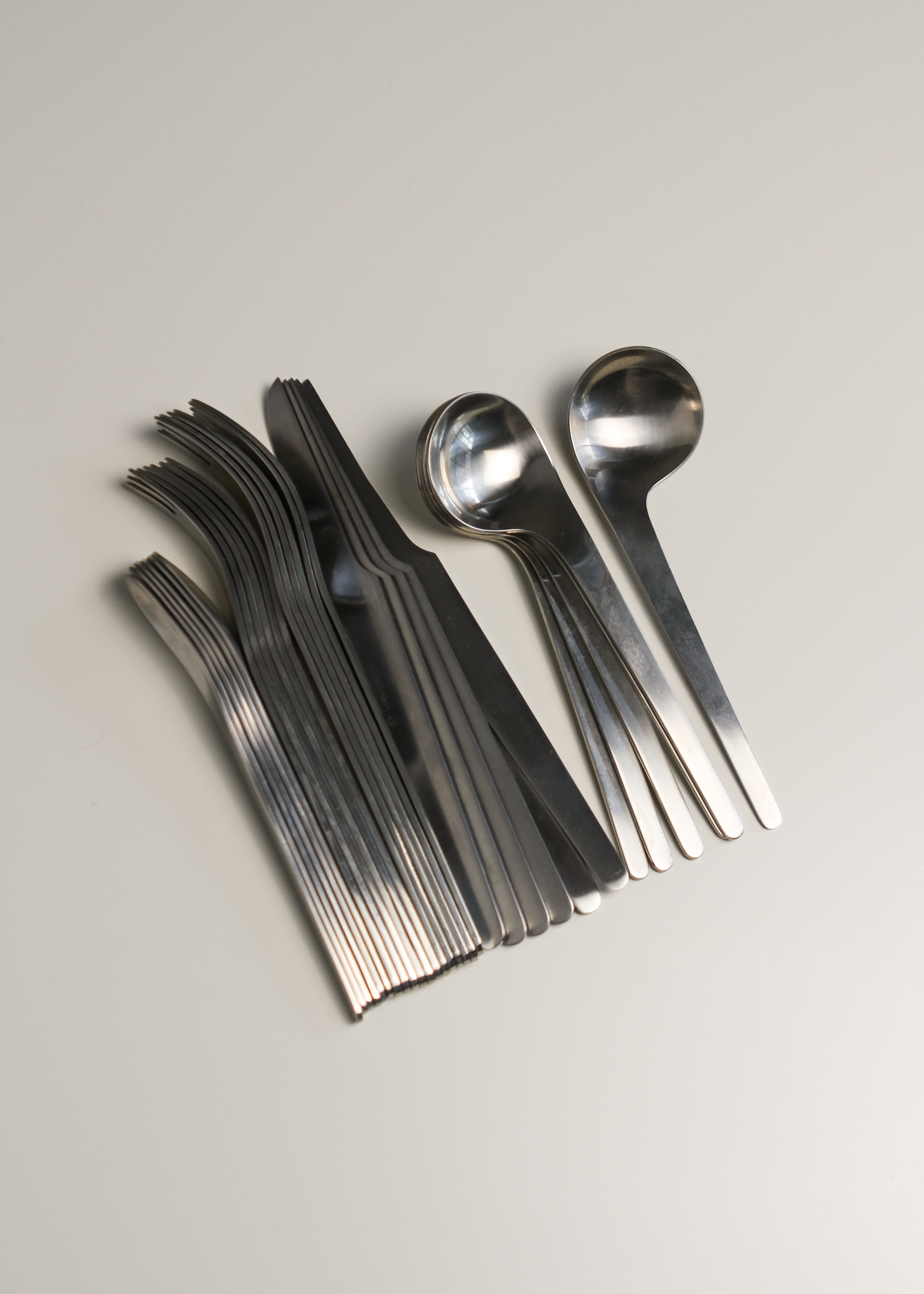 Arne Jacobsen for Georg Jensen flatware set. Shown on In Corso Studio, a vintage furniture platform in Toronto