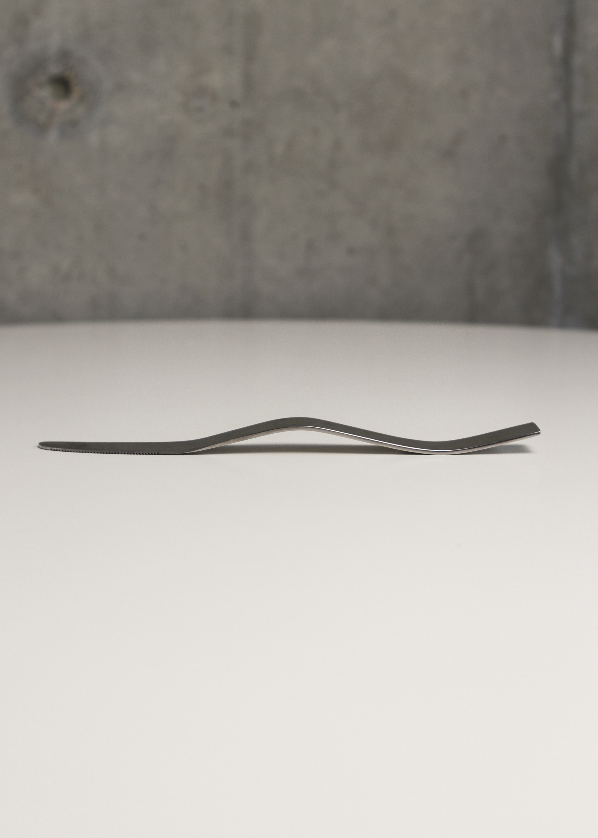 Squiggly flatware set by Benzer. Shown on In Corso Studio, a vintage furniture platform in Toronto.