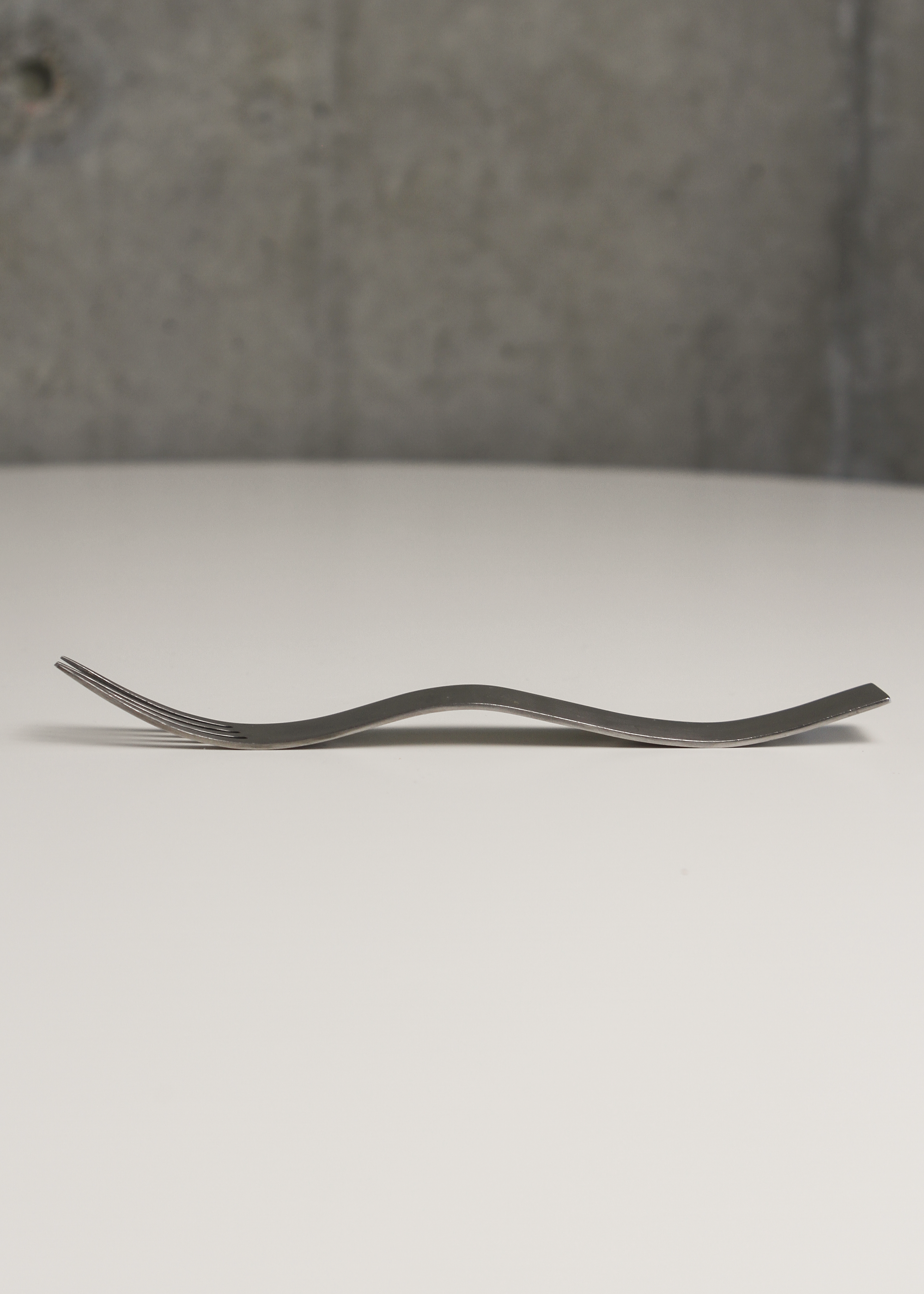 Squiggly flatware set by Benzer. Shown on In Corso Studio, a vintage furniture platform in Toronto.