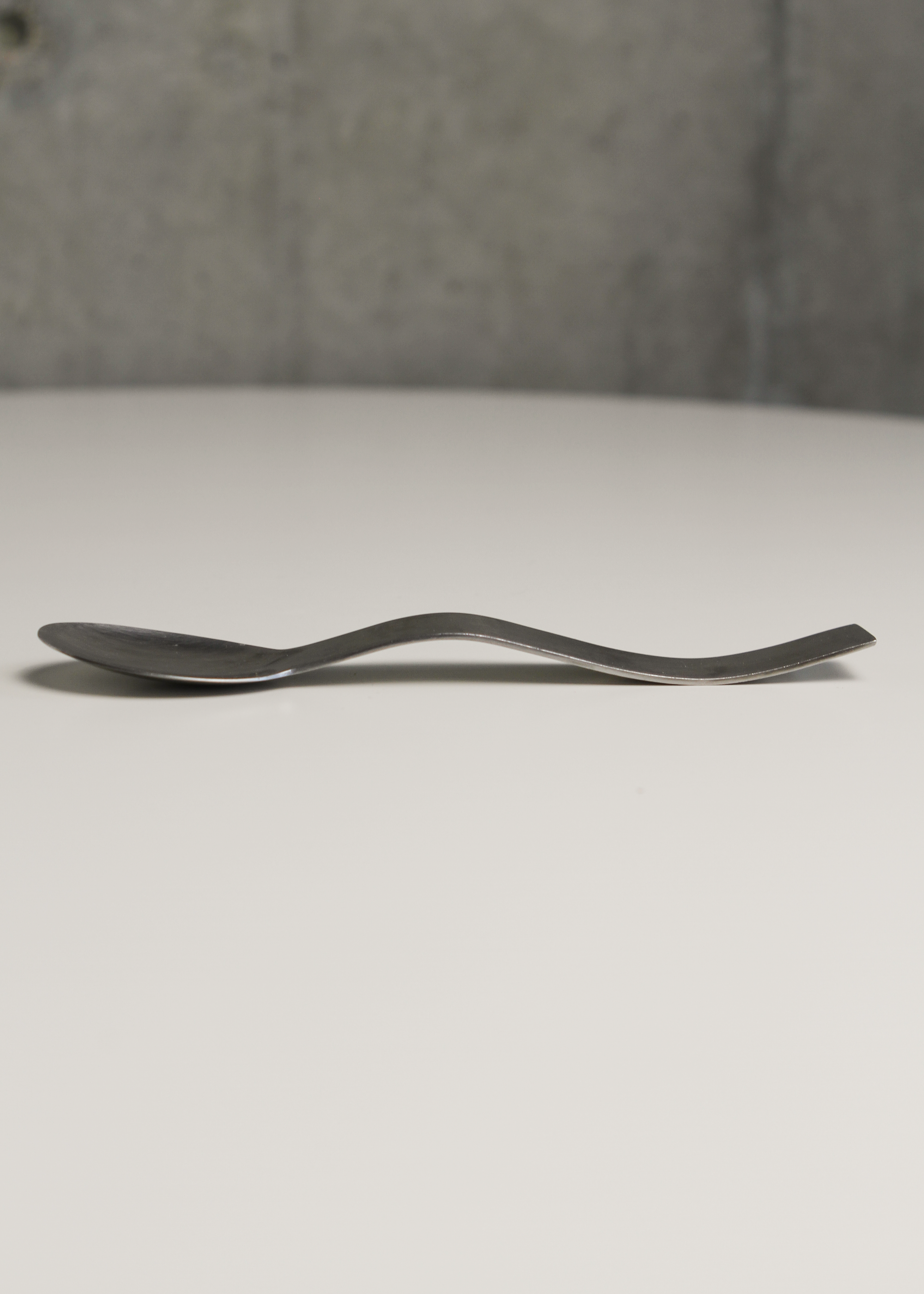 Squiggly flatware set by Benzer. Shown on In Corso Studio, a vintage furniture platform in Toronto.