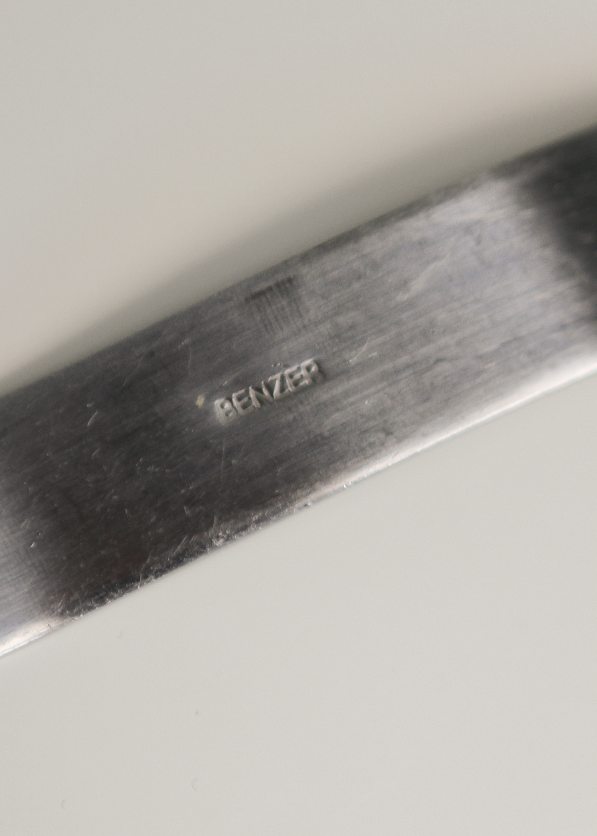 Squiggly flatware set by Benzer. Shown on In Corso Studio, a vintage furniture platform in Toronto.